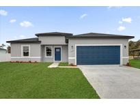 New construction home with gray exterior, blue garage door, and landscaped lawn at 15568 Sw 46Th Cir, Ocala, FL 34473