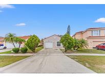 Charming single-story home with a well-manicured lawn and a private driveway, great curb appeal at 2317 Santa Lucia St, Kissimmee, FL 34743
