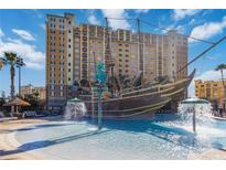 Resort-style pool with a unique pirate ship water feature at 8101 Resort Village Dr, Orlando, FL 32821