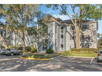 Two-story condo building with ample parking and landscaping at 4302 Clubside Dr # 4302, Longwood, FL 32779