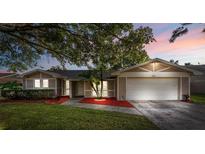Inviting ranch home with landscaped yard and attached garage at 1004 Bonita Dr, Altamonte Springs, FL 32714