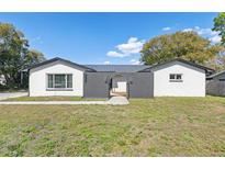 Charming single-story home with freshly painted exterior and metal roof at 6121 Bass Hwy, St Cloud, FL 34771