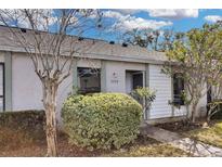 Cute and cozy single story home with a well-manicured lawn at 7729 Country Pl, Winter Park, FL 32792