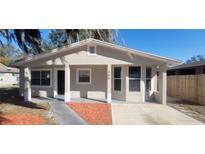 Updated exterior of charming single-story home with new landscaping at 305 S Candler Ave, Orlando, FL 32835