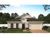 One-story home with a two-car garage and landscaped front yard at 4902 Chase Ct, St Cloud, FL 34772