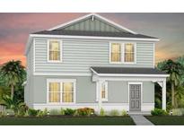 Two-story house with light gray siding, white trim, and landscaping at 5016 Oak Seed Way, St Cloud, FL 34771