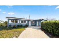 Charming ranch home with updated facade and landscaped yard at 1609 Stocking St, Daytona Beach, FL 32117
