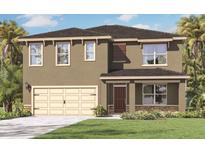 Two-story house with neutral siding, a two-car garage, and a neatly landscaped lawn at 33459 Copper Hill Way, Sorrento, FL 32776