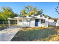 Charming single story home with a covered carport and landscaped yard at 555 Ruffel St, Maitland, FL 32751