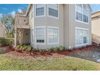 Charming townhouse featuring a private balcony, lush landscaping, and meticulous lawn maintenance at 686 Roaring Dr # 343, Altamonte Springs, FL 32714