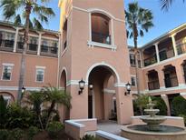 Exterior of a Mediterranean-style building with fountain at 211 Longview Ave # 306, Celebration, FL 34747