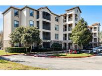 Apartment building with attractive landscaping and parking at 8020 Tuscany Way # 6401, Davenport, FL 33896
