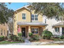 Beautiful two-story home with stone accents and landscaping at 15524 Aviation Aly, Winter Garden, FL 34787