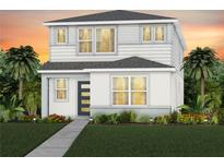 Two-story house with light gray siding, landscaped lawn, and walkway at 6935 Copperwood Ave, Orlando, FL 32829