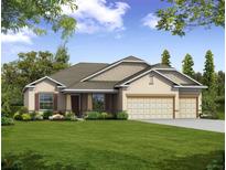 One-story house with a two-car garage and landscaped lawn at 1575 Weaver Oak Way, Deland, FL 32720