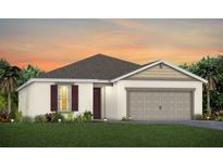 One-story home with two-car garage, neutral siding, and landscaping at 2705 Serenity Meadow Dr, Kissimmee, FL 34744