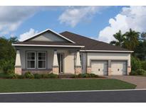 Charming single-story home featuring a stone-accented facade, two-car garage, and well-manicured lawn at 16880 Muskgrass Dr, Winter Garden, FL 34787