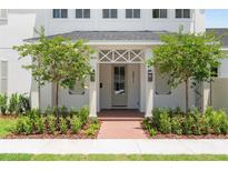 Charming home featuring a beautifully landscaped front yard and inviting front entrance at 3011 Amherst Ave, Orlando, FL 32804