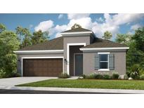 Charming single-story home showcasing a neutral color scheme, well-maintained lawn, and attached two car garage at 4698 Coral Harbour Rd, Kissimmee, FL 34758