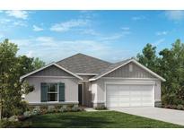 Charming single-story home with a two-car garage, landscaped front yard, and attractive curb appeal at 3934 Axis Valley Pl, St Cloud, FL 34772