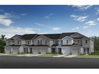 New construction townhomes boast traditional design, individual garages, neutral paint scheme and well-manicured landscaping at 386 Sequoia Dr, Lake Wales, FL 33859