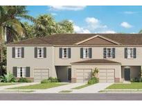 New home showcasing a charming, two-story townhome design, lush landscaping, and individual driveways, radiating curb appeal at 3380 Private Oak Dr, Apopka, FL 32703