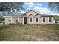 Charming single-story home featuring a well-manicured front lawn at 2655 Sheila Dr, Apopka, FL 32712