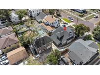 Charming home with a pool and lush greenery in a desirable neighborhood setting at 627 N Hyer Ave, Orlando, FL 32803