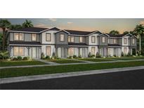 A row of newly built townhomes with neat lawns, sidewalks, and similar exterior finishes at 6736 Reverie Park Ave, Orlando, FL 32829