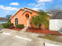 Charming single-story home with a well-manicured lawn and inviting curb appeal at 1727 Winter Green Blvd, Winter Park, FL 32792