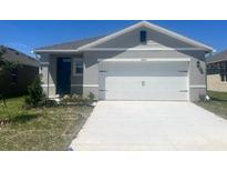 Charming single-story home with a two-car garage and well-maintained lawn at 3623 Marlbrry Way, Sanford, FL 32773