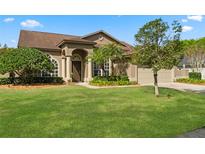 Charming single-story home with a well-manicured lawn and inviting front entrance, including a 2-car garage at 338 Silver Pine Dr, Lake Mary, FL 32746