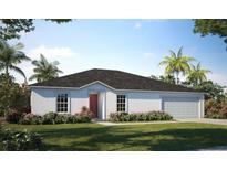 Charming single-story home with a well-manicured lawn and beautiful landscaping at 313 Marquee Dr, Kissimmee, FL 34758