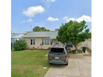 Charming one-story home with well-maintained front lawn and driveway at 491 Grandview Ave, Ormond Beach, FL 32176