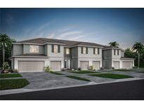 Charming townhome exterior with individual garages, lush lawns and sidewalks at 3133 Emerald Acres Ln, Sanford, FL 32771
