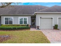 Charming single-story home with a well-manicured lawn and a cozy front entrance at 3632 Solana Cir # B, Clermont, FL 34711