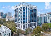 Modern high-rise condo building with expansive windows and balconies, offering stunning city views at 260 S Osceola Ave # 601, Orlando, FL 32801