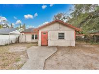 Exterior view of a small home featuring a quaint design and compact yard space at 1014 24Th St, Orlando, FL 32805