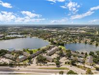 Beautiful aerial view of community featuring lush landscaping, lakes and multiple buildings at 942 Lake Destiny Rd # B, Altamonte Springs, FL 32714