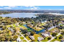 Stunning aerial view showcasing the lakefront property and expansive waterway access at 2431 Westwood Dr, Longwood, FL 32779
