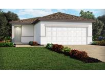 Charming single-story home with a manicured lawn and two car garage at 4002 Copperleaf Ln, Poinciana, FL 34759