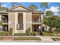 Inviting condo building with well-maintained landscaping and multiple units at 1055 Kensington Park Dr # 503, Altamonte Springs, FL 32714