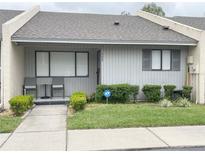 Charming single story villa with well-maintained lawn and walkway to the front door at 2600 Lucerne Park Rd # 529, Winter Haven, FL 33881