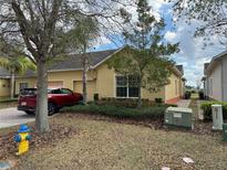 Charming single-story home with a two car garage, landscaped yard and tasteful exterior paint at 3640 Solana Cir # A, Clermont, FL 34711