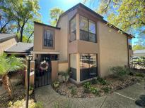 Inviting two-story townhome with a private gated entry and lush landscaping at 940 Douglas Ave # 189, Altamonte Springs, FL 32714