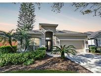 Charming single Gathering home with a well-manicured lawn and inviting curb appeal at 1071 Kersfield Cir, Lake Mary, FL 32746