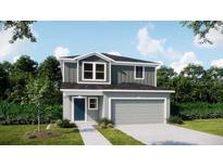 Charming two-story home with gray accents, a two-car garage, and a well-manicured lawn at 3860 Bluethread Way, Kissimmee, FL 34759