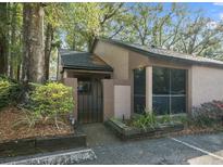 Charming condo with a gated front entrance and lush landscaping surrounding the property at 940 Douglas Ave # 110, Altamonte Springs, FL 32714
