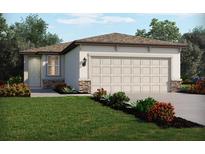 Charming single-story home with a two-car garage and a well-manicured lawn at 2511 Linda Knoll Ln, Bartow, FL 33830