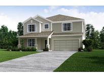 Charming two-story home with neutral colors, manicured lawn, and a two-car garage at 3222 Viceroy Ct, Kissimmee, FL 34759
